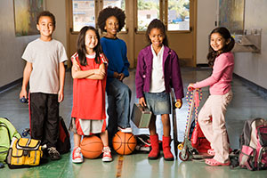 Kids with sports equipment