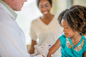 Child receiving a flu shot