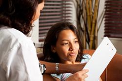 Teen girl with doctor